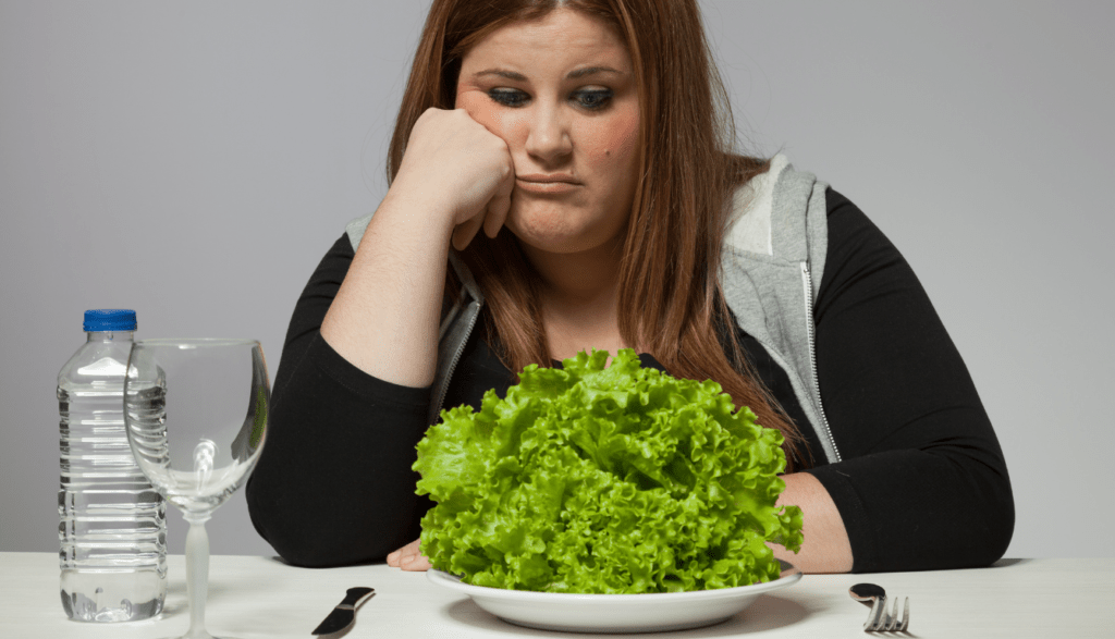 A girl with sad meal